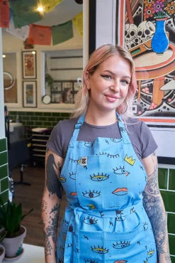 Lucy & Yak Ada - Cotton Apron in Oko Eyes Print Hot