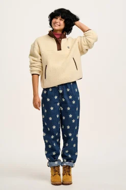 Lucy & Yak Addison - Tapered Denim Jeans in Mid Wash with Daisy Embroidery Hot