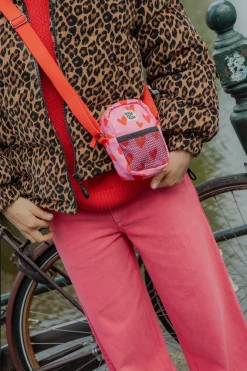 Lucy & Yak Brady - Crossbody Cotton Twill Bag in Pink Heart Cupid Print Hot