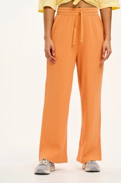 Lucy & Yak Larson - Wide Leg Waffle Cotton Joggers in Sunset Orange Sale